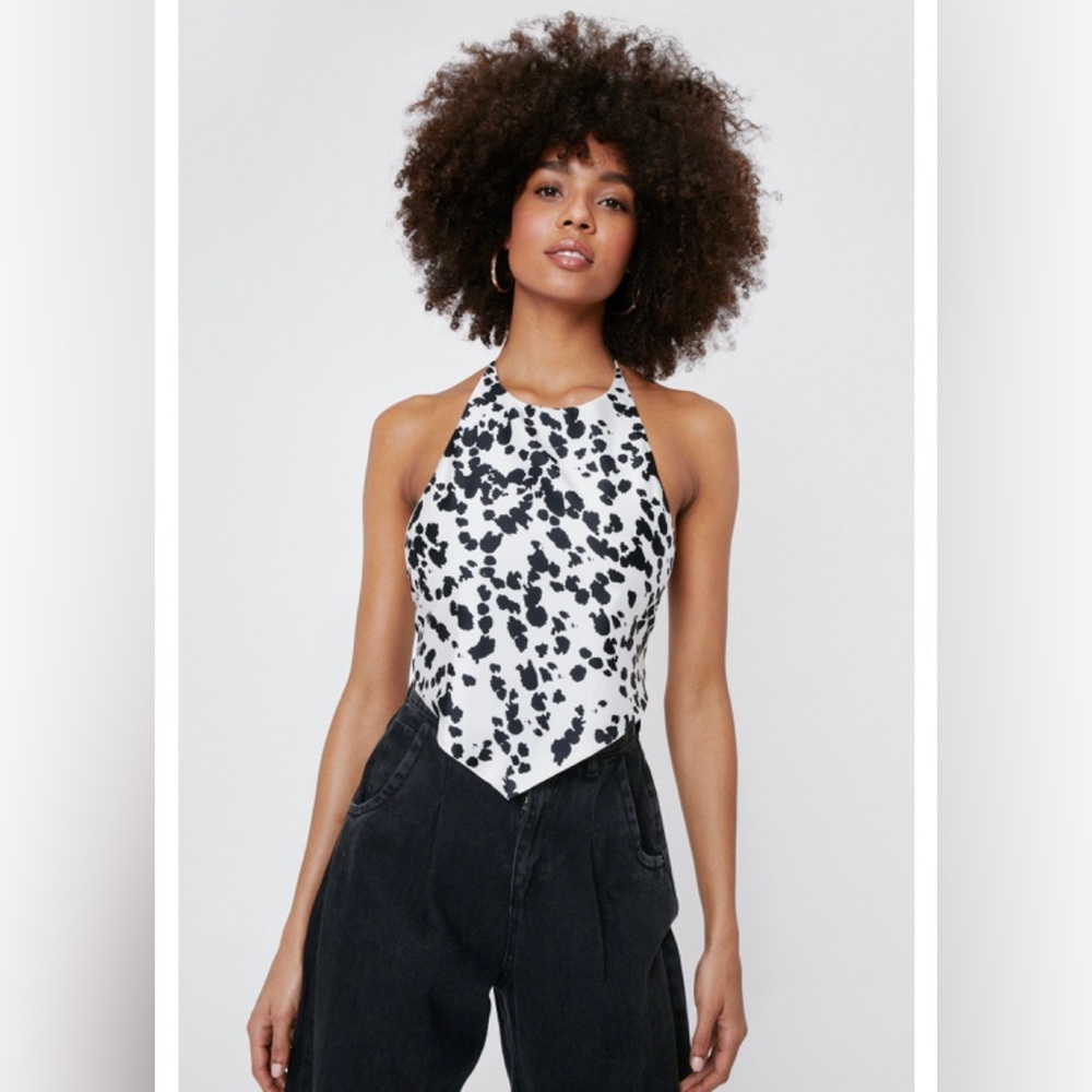 Nasty Gal cow pattern top. Open back/Handkerchief style. Size 10 - fits small.